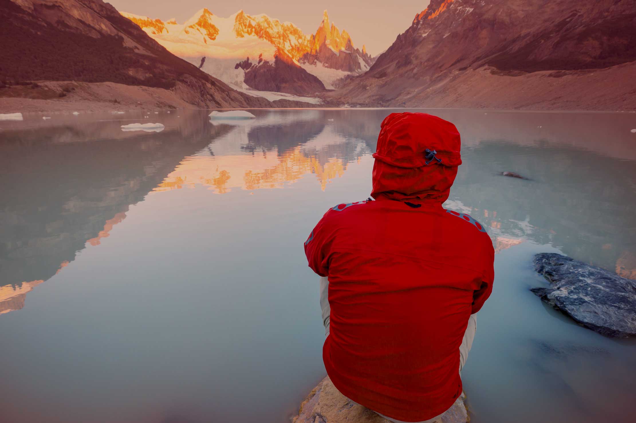 Person looking over lake scene